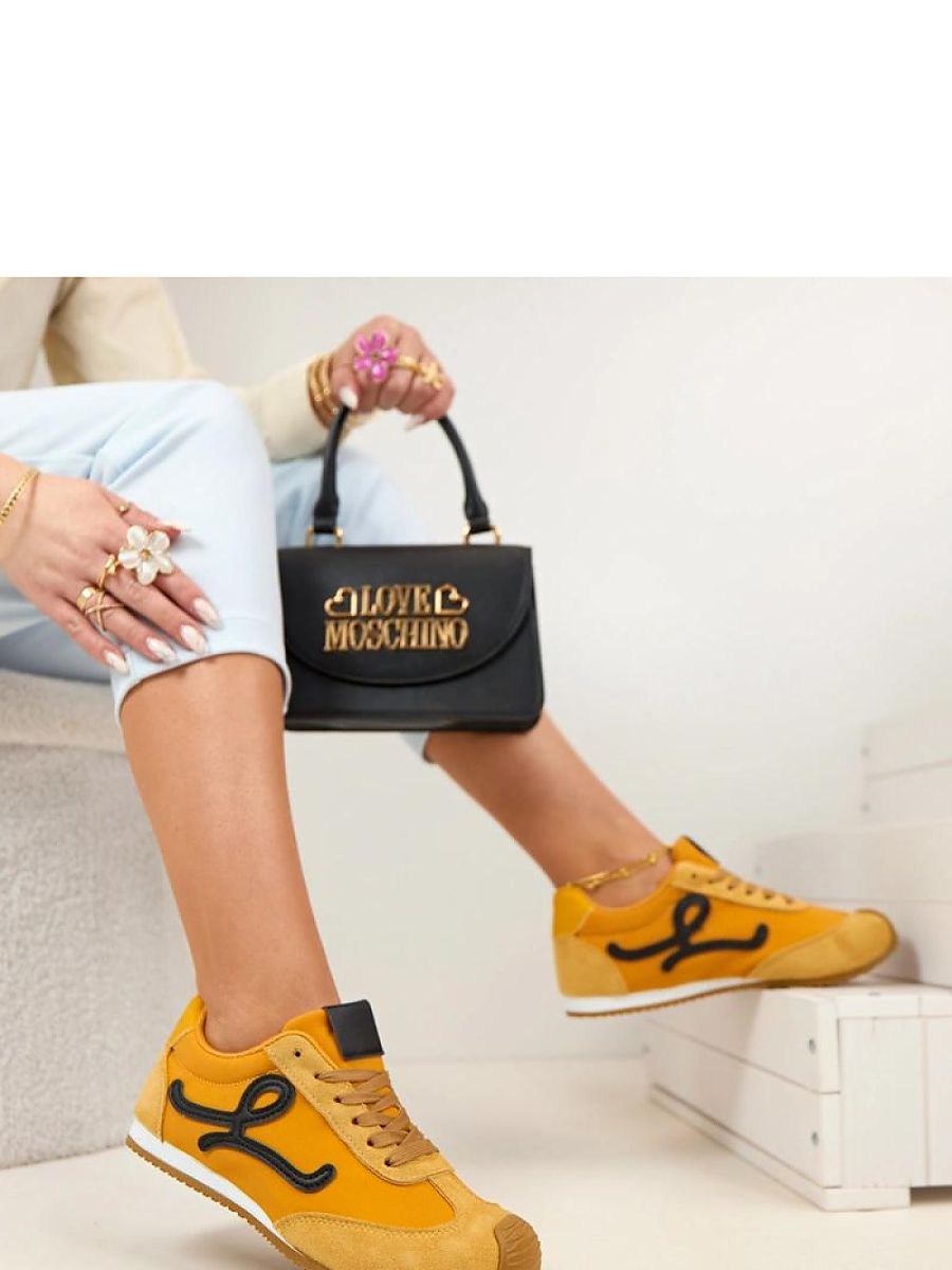 Baskets jaunes femme coupe basse patchs décoratifs cuir suédé