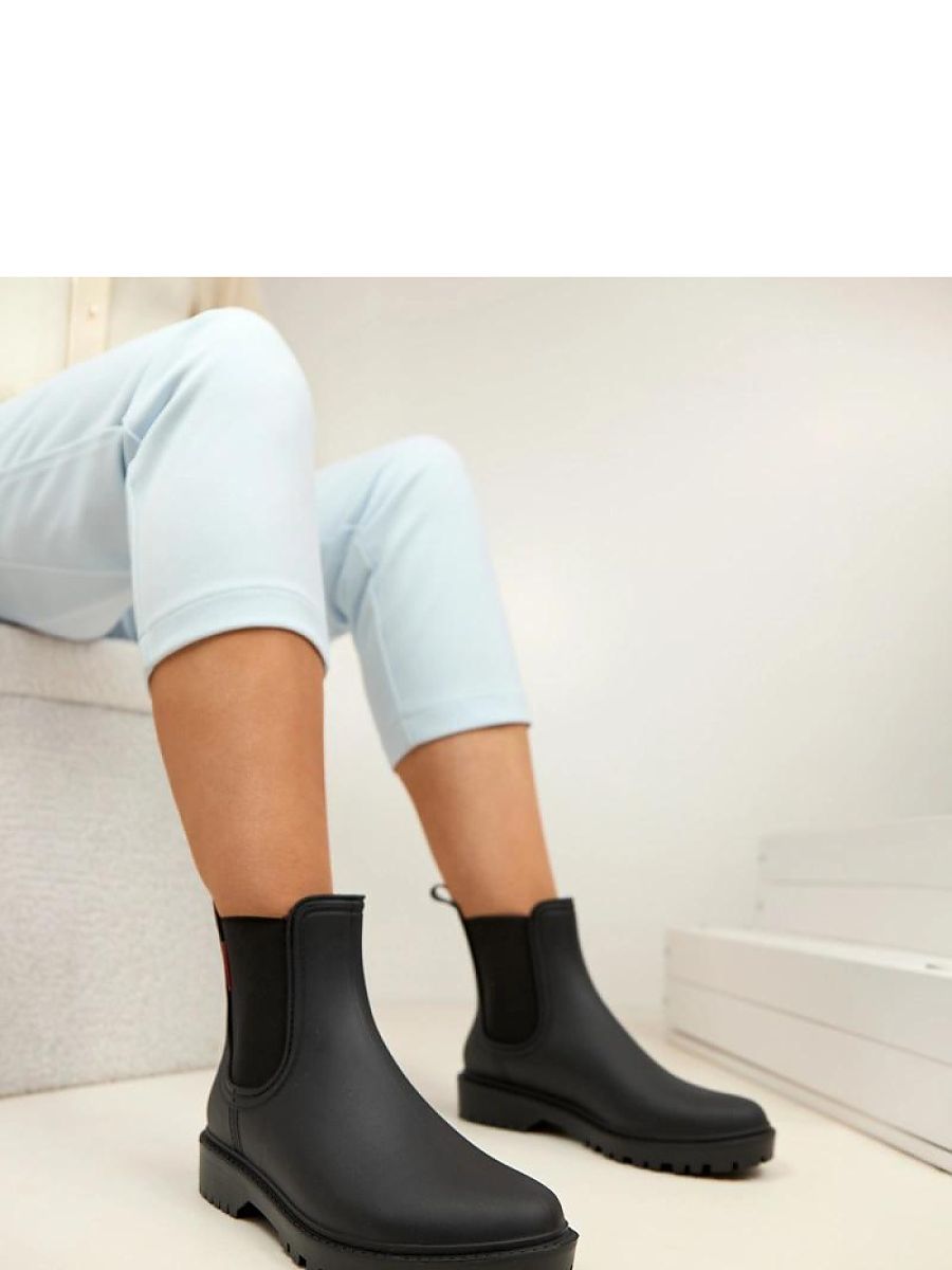 Bottes de pluie noires en caoutchouc pour femme, vue de profil — vue 3