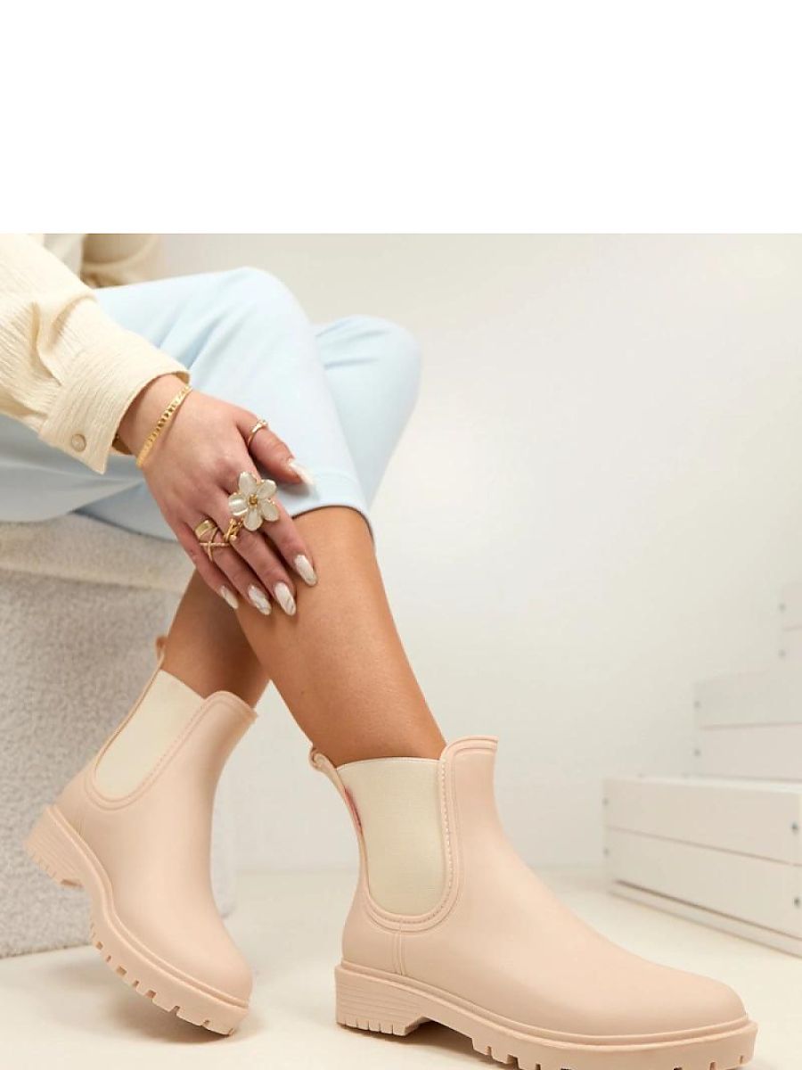 Bottes de pluie beige en caoutchouc, vue de profil